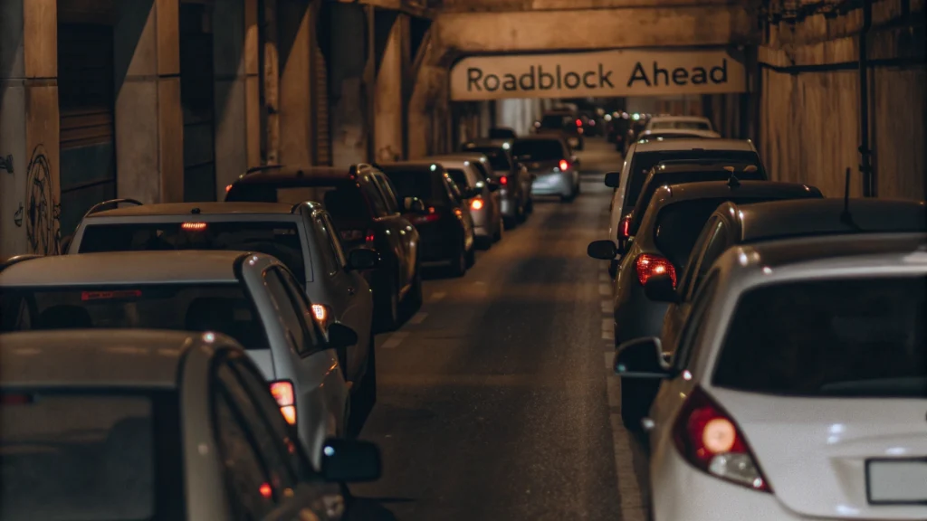 Exploring Your Inner Compass 5 A Traffic Jam With A Sign The Reads “Roadblock” In The Distance